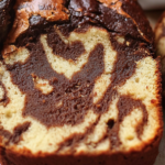 Este bizcocho marmolado es perfecto para cualquier ocasión, suave y delicioso, ¡una combinación que encanta a todos!